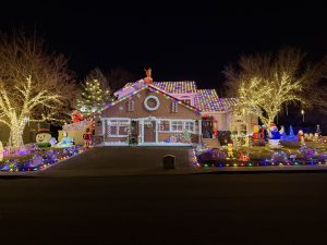 IMG_0335 | Reno Tahoe Holiday Lights Night scene of a Christmas house with colorful lights and trees wrapped in warm LEDs.
